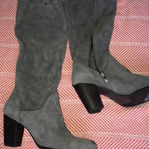 Woman’s size 12 ugg heeled boots NWT